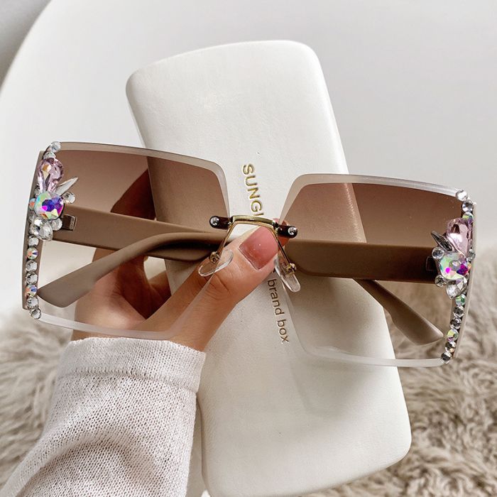 Nude ladies sunglasses with jewel embellished detail
