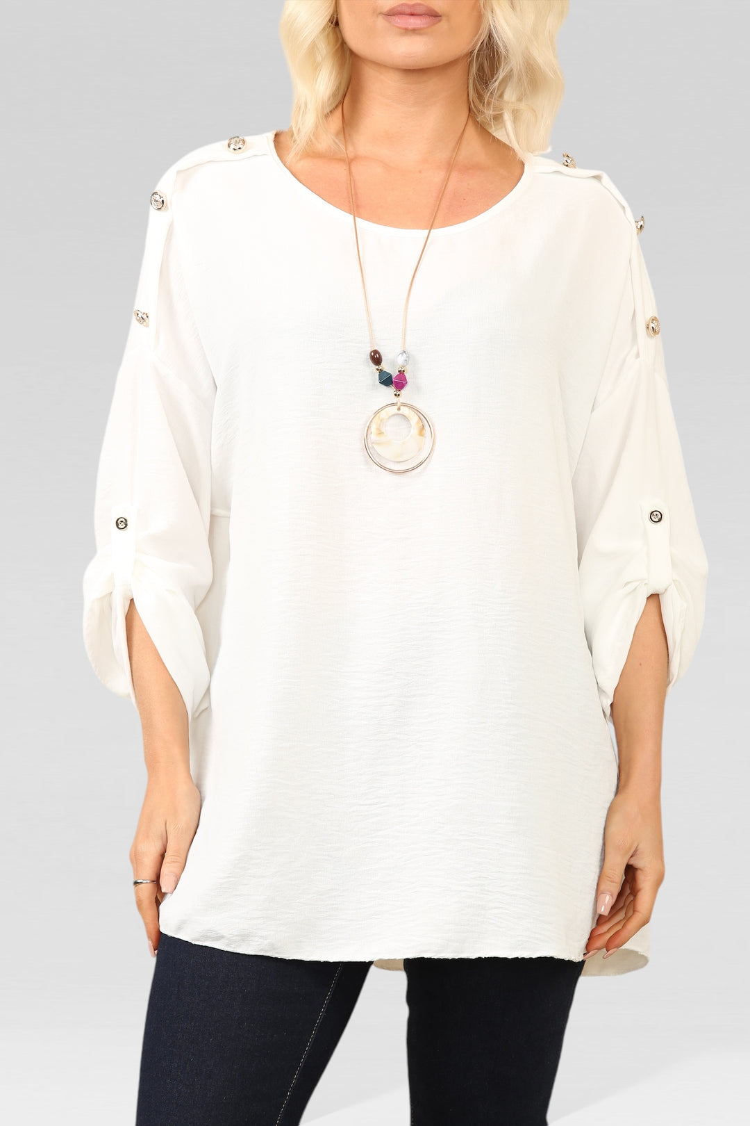 white blouse with necklace